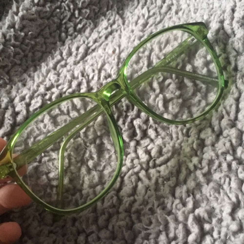 Green glasses and purple sunglasses